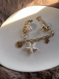 Sea shells and charm bracelet